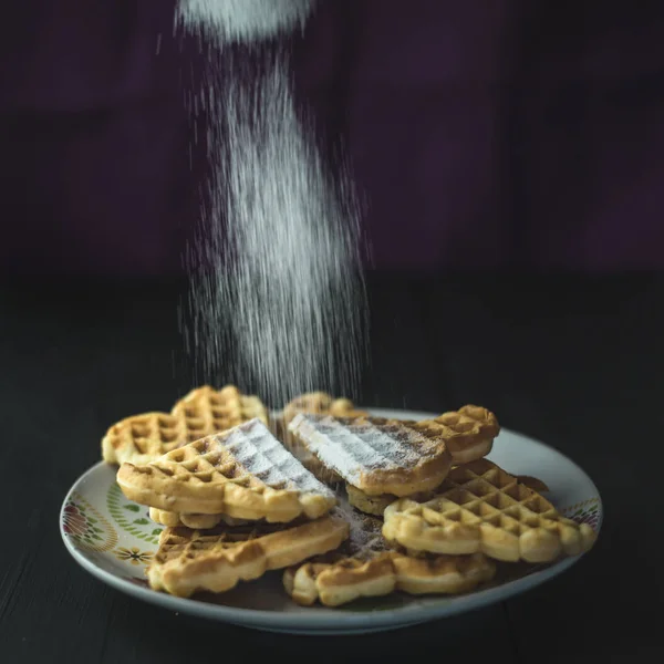 Waffles com açúcar de confeiteiro — Fotografia de Stock