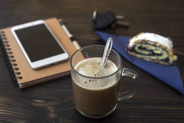 Cup of coffee, organizer and mobile phone on desk — Stock Photo, Image