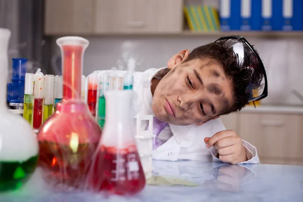 Scientist boy working in a laboratory — Stock Photo, Image