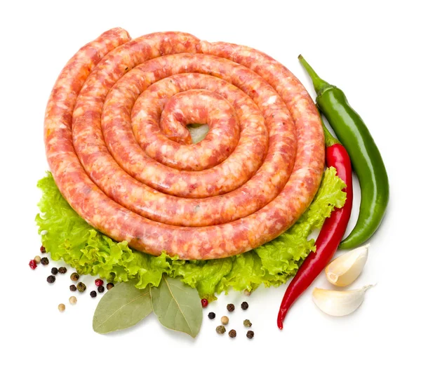 Traditionelle dünne Schweinswurst auf Salat — Stockfoto