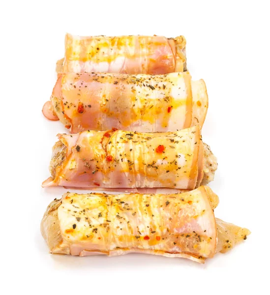 Bacon wrapped chicken breast marinated on spicy sauce — Stock Photo, Image