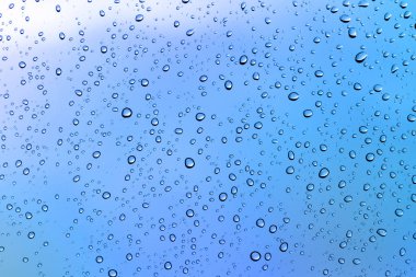 Mavi Arkaplanda Su Damlaları