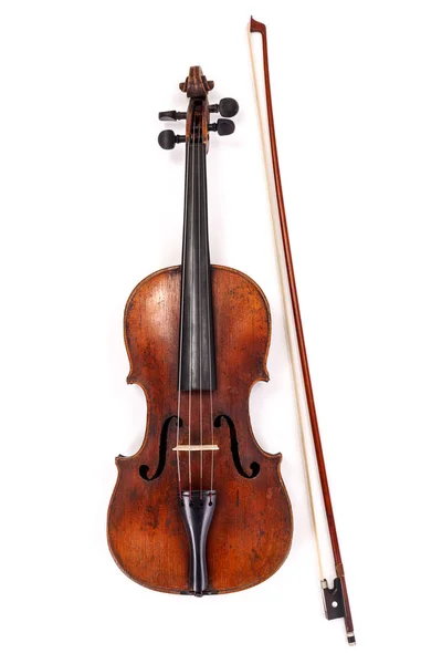 Gammal violin med rosett på vit bakgrund — Stockfoto