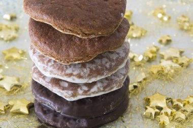 Almanya 'da sade, buzlu ve çikolatalı Oblatenlebkuchen (veya zencefilli kek) çeşitleri