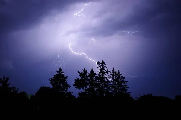 thunder and lightning in the night sky