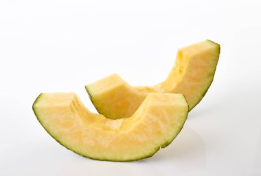 Hamigua kavun dilimler halinde, Hami kavun kesip, Hami kavun beyaz arka plan üzerinde izole. IMAG yığını