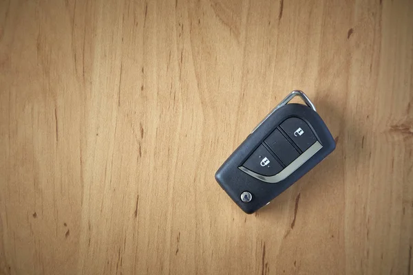 remote car key on wooden background