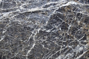 Doğal görünüyor bir yüzey üzerinde siyah mermer desen