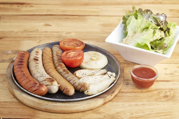 Sausage, salad sesame sauce — Stock Photo, Image