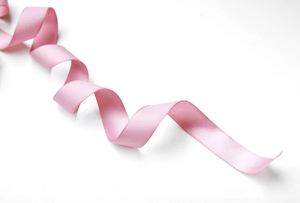 Pink curly ribbon — Stock Photo, Image