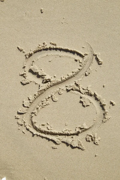 Números escritos en la arena — Foto de Stock