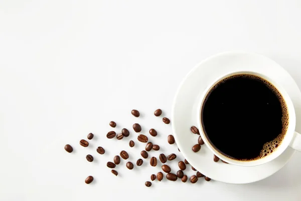 Csésze kávé és kávé bab — Stock Fotó