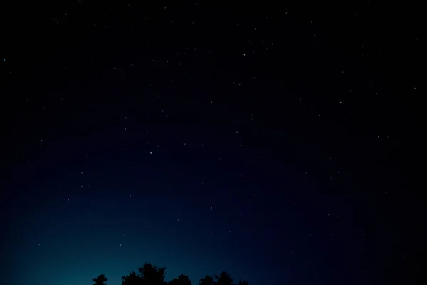 Noite azul céu estrelas fundo — Fotografia de Stock