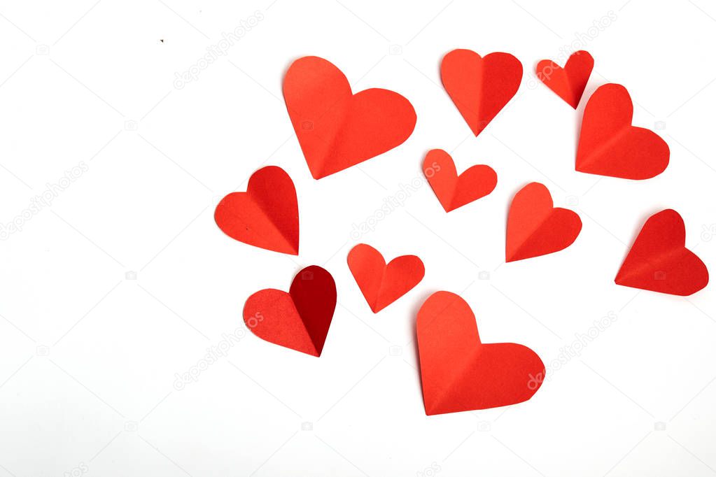 Red paper hearts isolated on white background