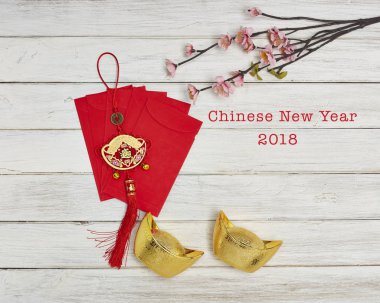 Çin yeni yılı festival süsleri, Altın külçeler Çince karakteri fal ve şans anlamına gelir