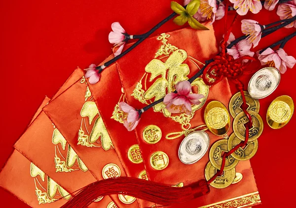 Chinese new year decorations on red paper background, Text space image ,top view, Flat lay Chinese new year