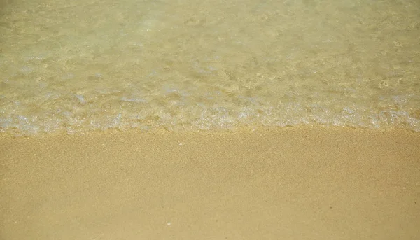 Wave of the sea on the sand beach — Stock Photo, Image