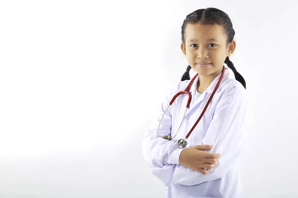 Niña sueño en un traje médico — Foto de Stock