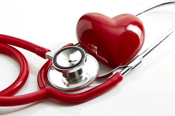 Red stethoscope with red heart — Stock Photo, Image