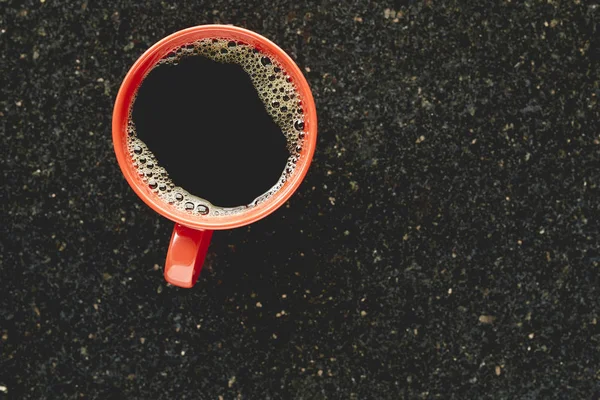 Cup of coffee on granite table