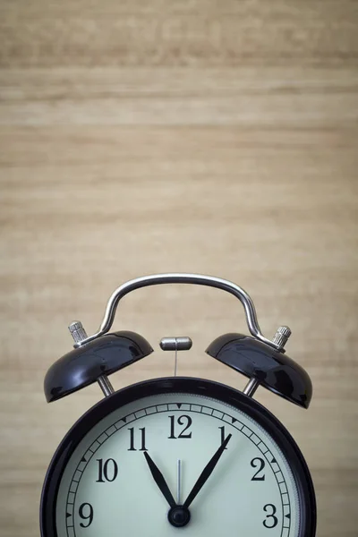 Alarm clock wood table Royalty Free Stock Photos