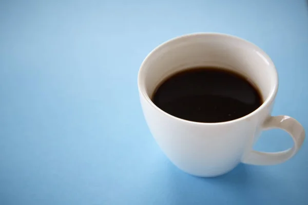 Black coffee in white mug — Stock Photo, Image