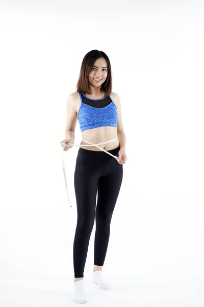Asijská dívka krásy v obleku fitness — Stock fotografie