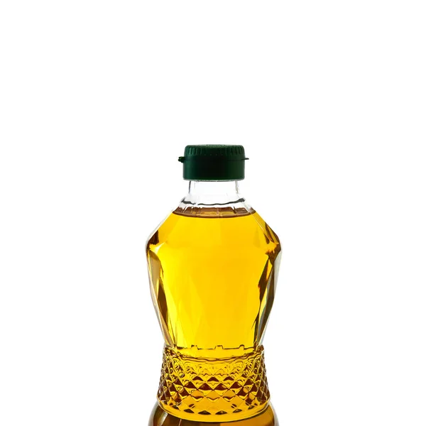 Vegetable oil in plastic bottle on white Royalty Free Stock Photos