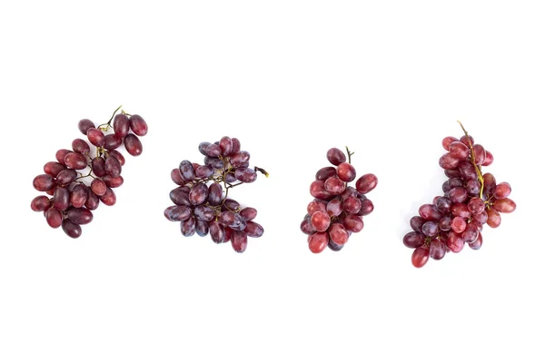 Mazzo di uva fresca matura e succosa su bianco — Foto Stock