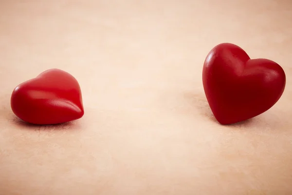 Two red hearts on Pink background — Stock Photo, Image