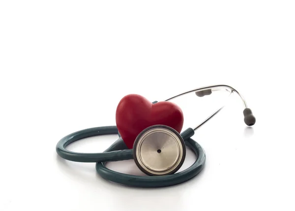 Red heart and a stethoscope on white — Stock Photo, Image