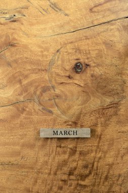 template for march on wooden background