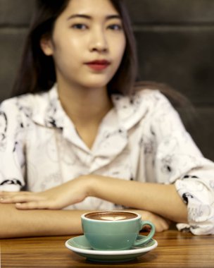 Woman with Coffee Mug Hot latte art