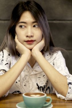Woman with Coffee Mug Hot latte art