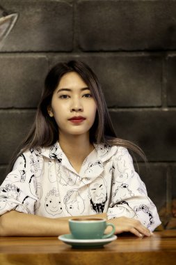Woman with Coffee Mug Hot latte art