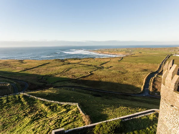 Epic Aerial Scenic Irish Castle landscape view from Doolin in Co