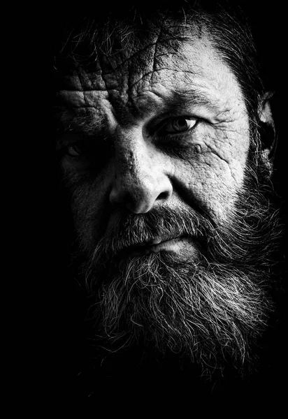 Studio portrait of fully bearded man in black and white.  Closeup face with facial expression. — Stock Photo, Image