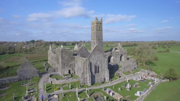 Aerial view of an Irish public free tourist landmark, Quin Abbey, County clare, Ireland. Aerial landscape view of this beautiful ancient celtic historical architecture in county clare ireland. — Stock Video