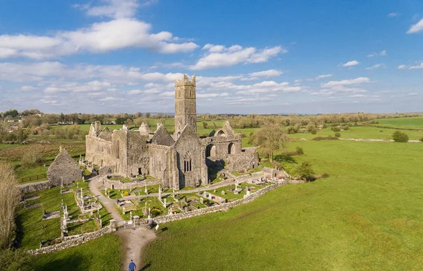 Aerial view of an Irish public free tourist landmark, Quin Abbey, County clare, Ireland. Aerial landscape view of this beautiful ancient celtic historical architecture in county clare ireland. — Stock Photo, Image