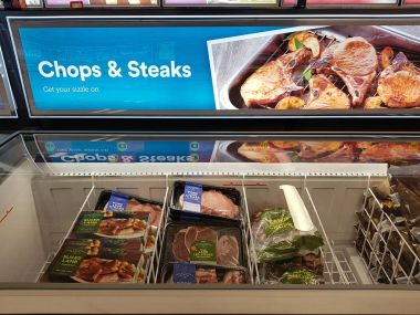 Limerick, Ireland - Feb 8th, 2018: Iceland Foods Store, Limerick, Ireland. Selection of various frozen chops and steaks Irish produce. clipart