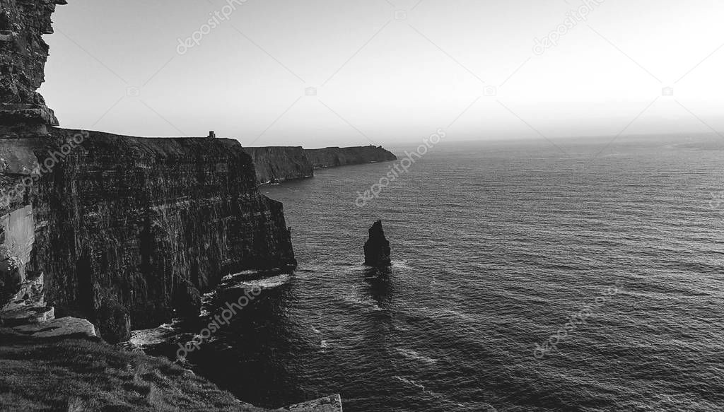 Beautiful Black and White Scenic Aerial drone view of Ireland Cliffs Of Moher in County Clare. Sunset over the Cliffs of Moher. Epic Irish rural countryside landscape along the wild atlantic way