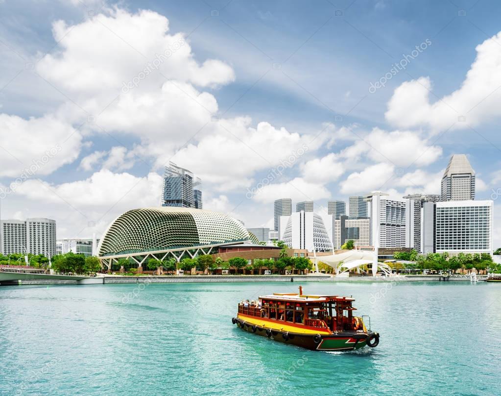 Scenic view of tourist boat sailing along Marina Bay, Singapore