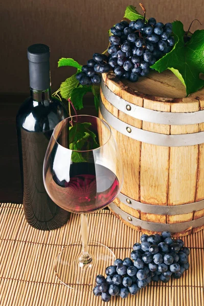 Top view of barrel, bottle and glass of red wine — Stock Photo, Image