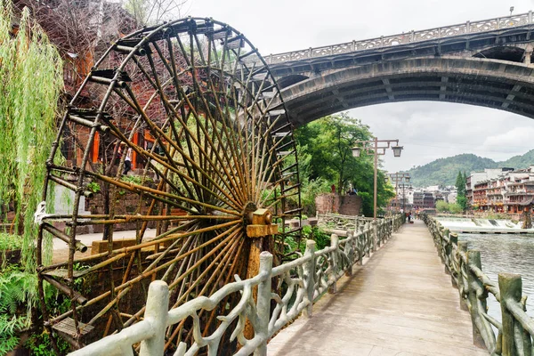 Scenic water wheel and bridge in Phoenix Ancient Town, China