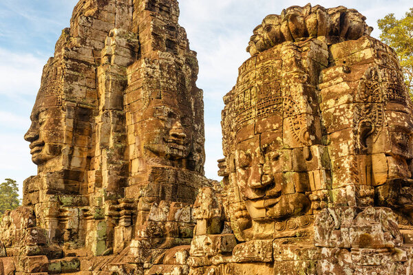 Wonderful view of towers with stone faces of Bayon temple