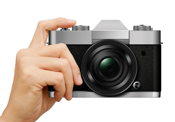 Klassisk kamera i handen på vit bakgrund — Stockfoto