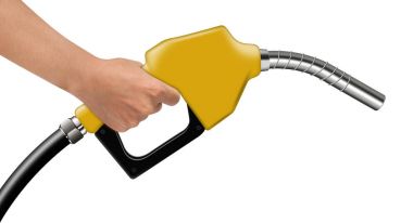 Hand hold yellow fuel nozzle on a white background clipart