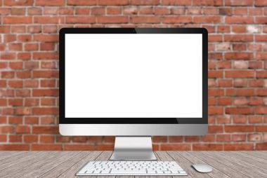 Kırmızı tuğla duvar arka plan ile ahşap masa üzerinde modern bilgisayar