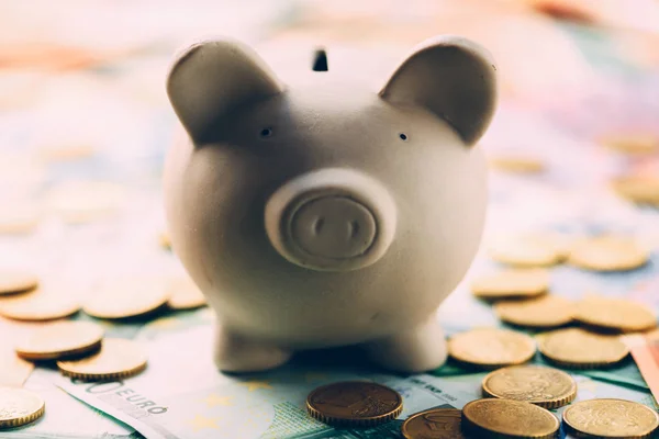 Piggy moneybox with euro cash — Stock Photo, Image
