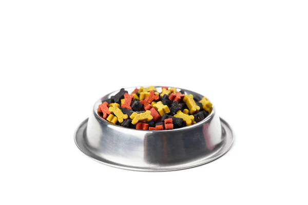 Droge botvorm hondenvoer in metalen plaat geïsoleerd — Stockfoto